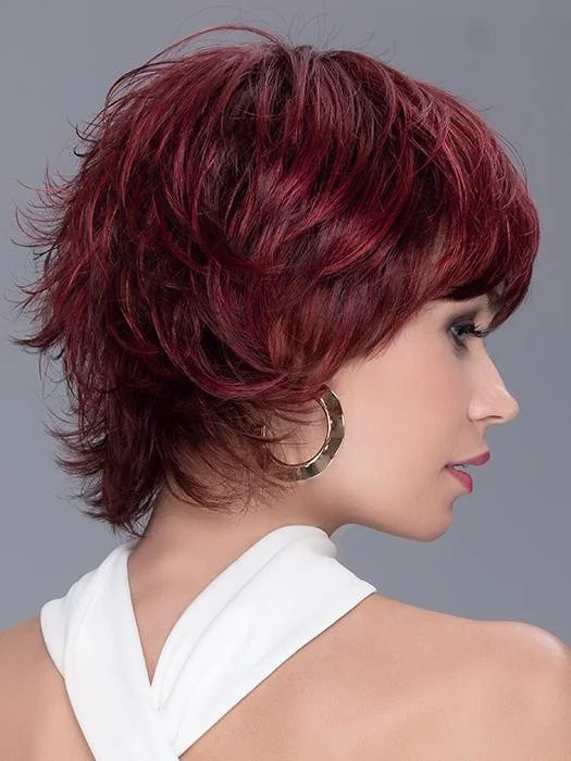 Short textured burgundy wig with layered fringe and sleek back for a stylish look