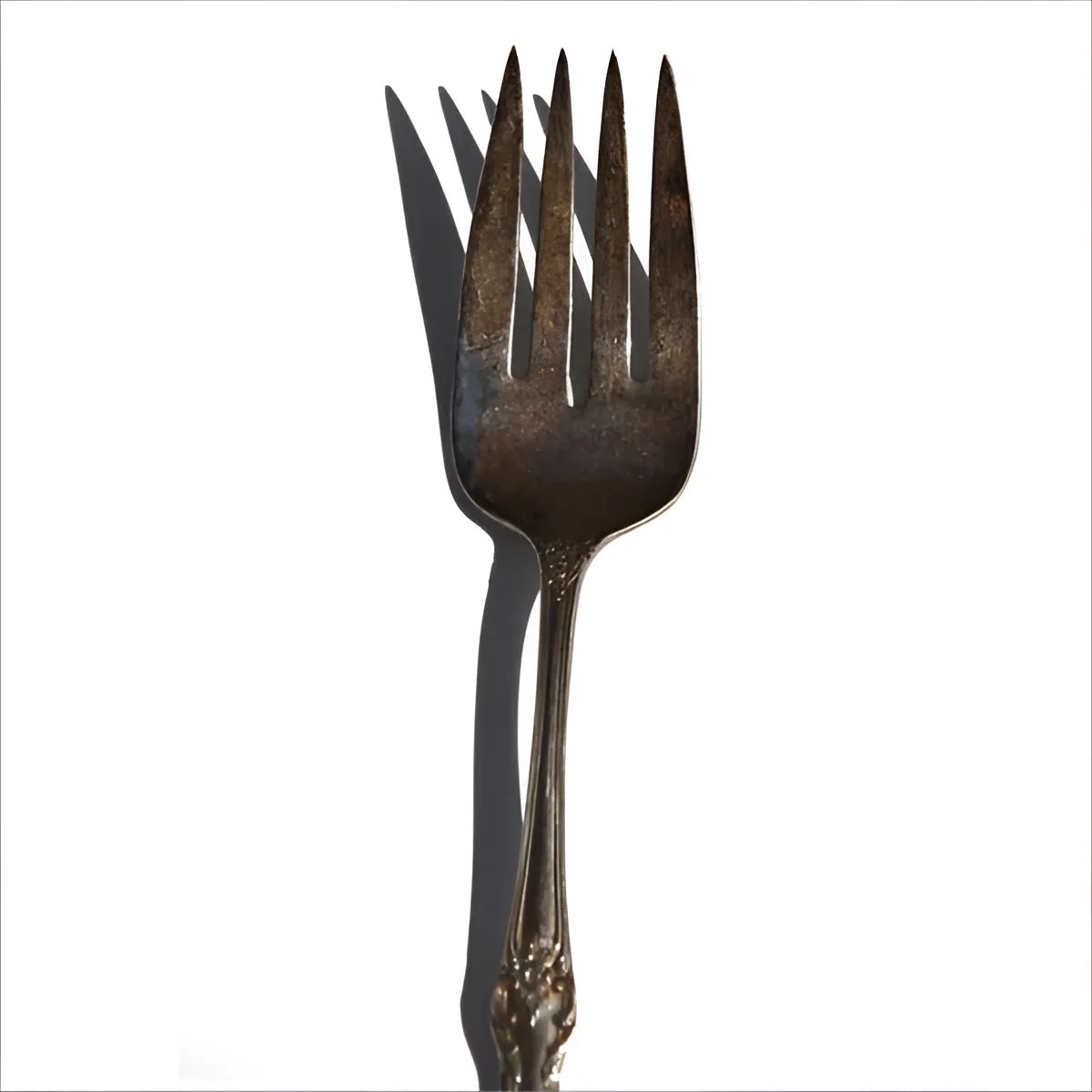 Fork adorned with a black bow tie alongside the elegant White Diamond Hat