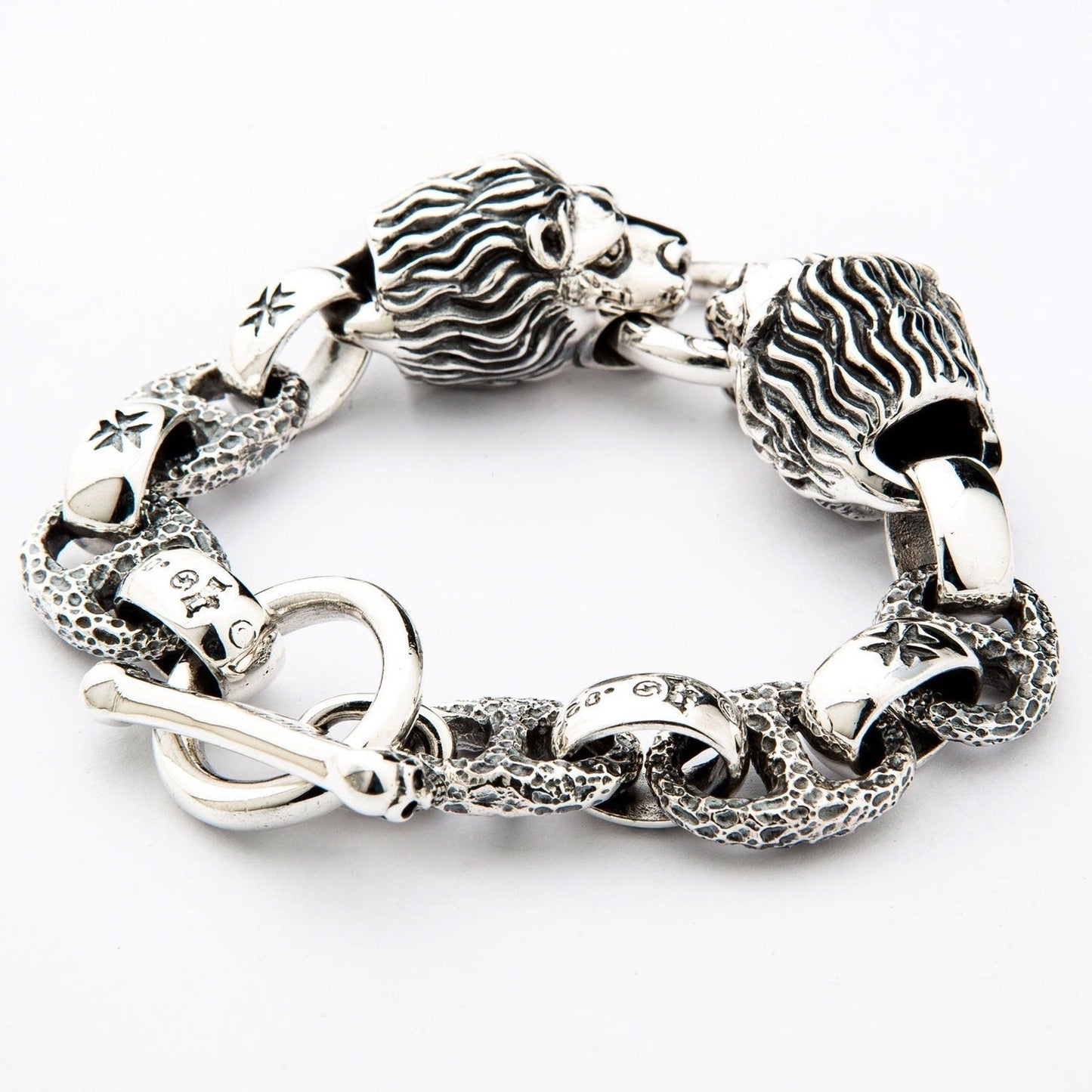 Silver lion head bracelet with intricate details and toggle clasp for Remove BG Test