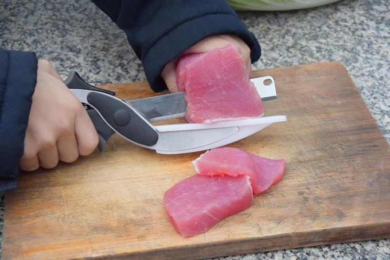Black and silver precision cutting knife with textured handle for detailed work