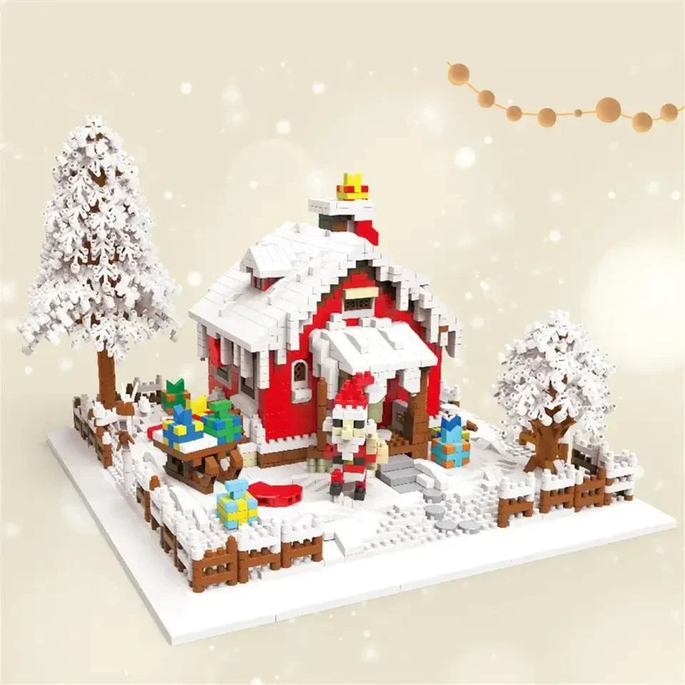 Red and white Lego Christmas house set with snow-covered trees and Santa figure