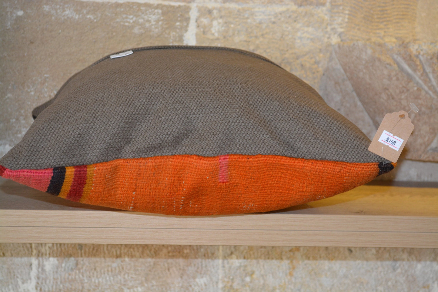 Gray and orange geometric fabric cushion for Updated Title New product display