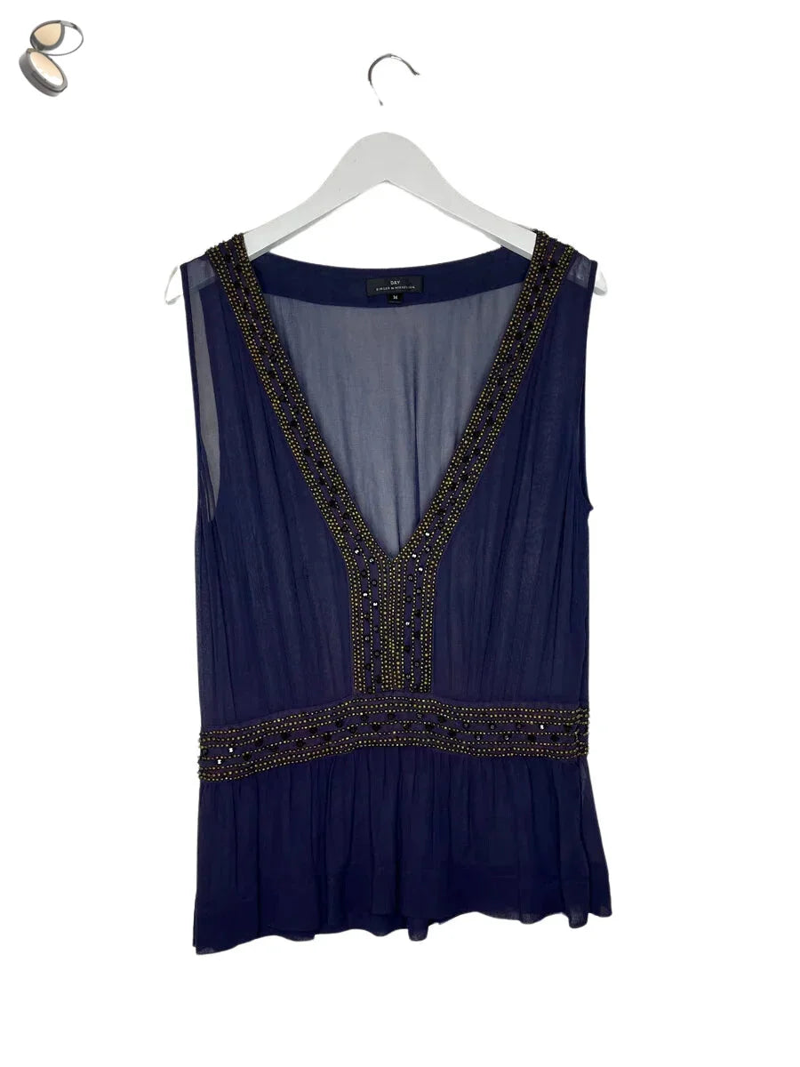 Navy blue sheer top with beaded neckline and peplum hem from Updated Title New