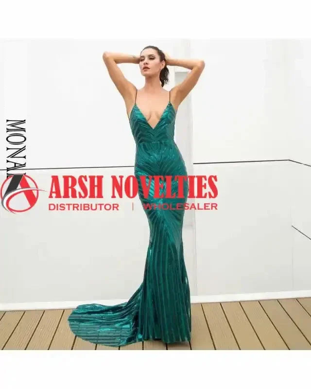 Emerald green mermaid gown with deep V-neck and long train for elegant evening wear