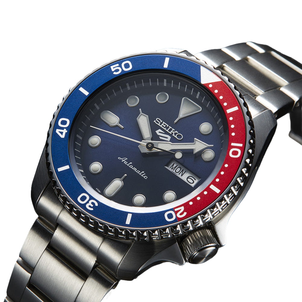 Seiko SRPD53 watch with blue dial and red bezel displayed front view