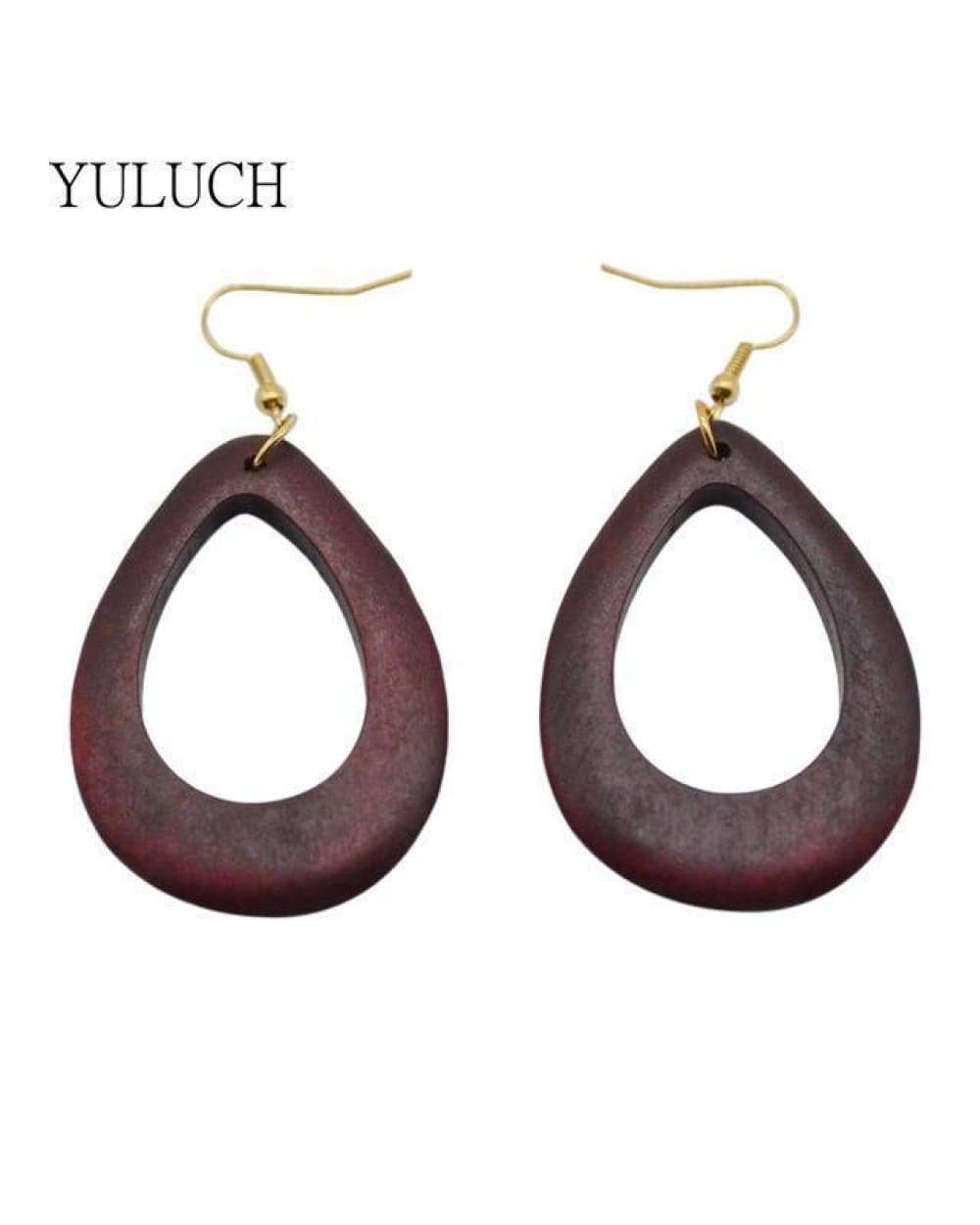 Dark wooden teardrop hoop earrings with gold hooks displayed on Swap Images Product