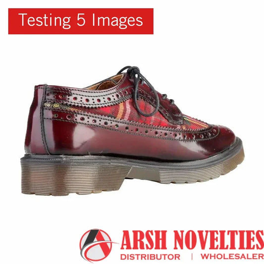 Glossy oxblood red brogue shoe with plaid fabric inserts and black laces