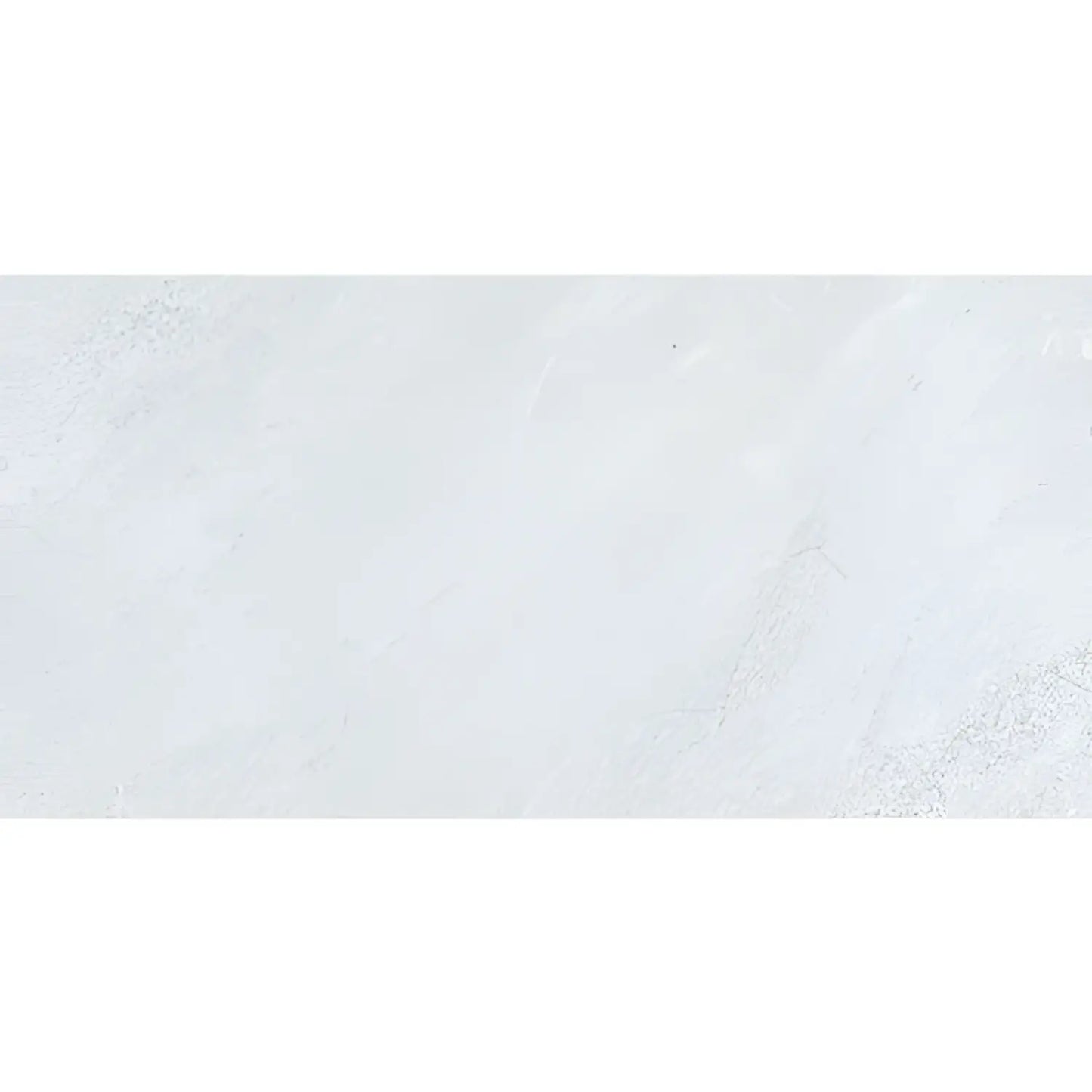 A sleek white marble tile from upscale test tiles flooring with subtle veining perfect for sports and fitness spaces
