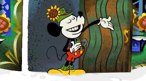 Animated Gif featuring Mickey Mouse plush toy in green hat and red pants
