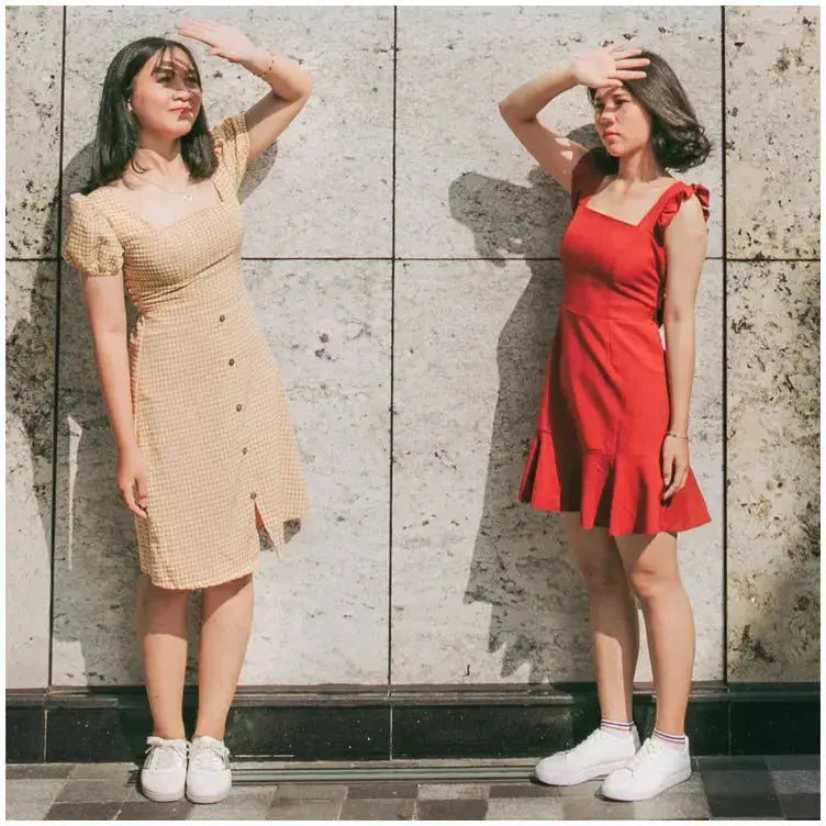 Beige textured men’s dress with button front short sleeves and white sneakers