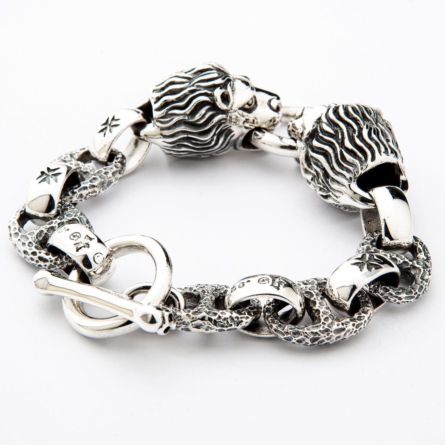 Silver lion head bracelet with intricate details and toggle clasp for Remove BG Test