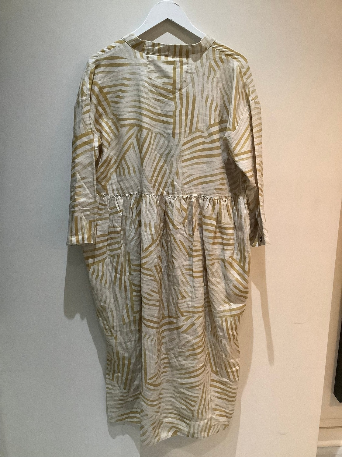 Beige and brown zebra print dress with long sleeves