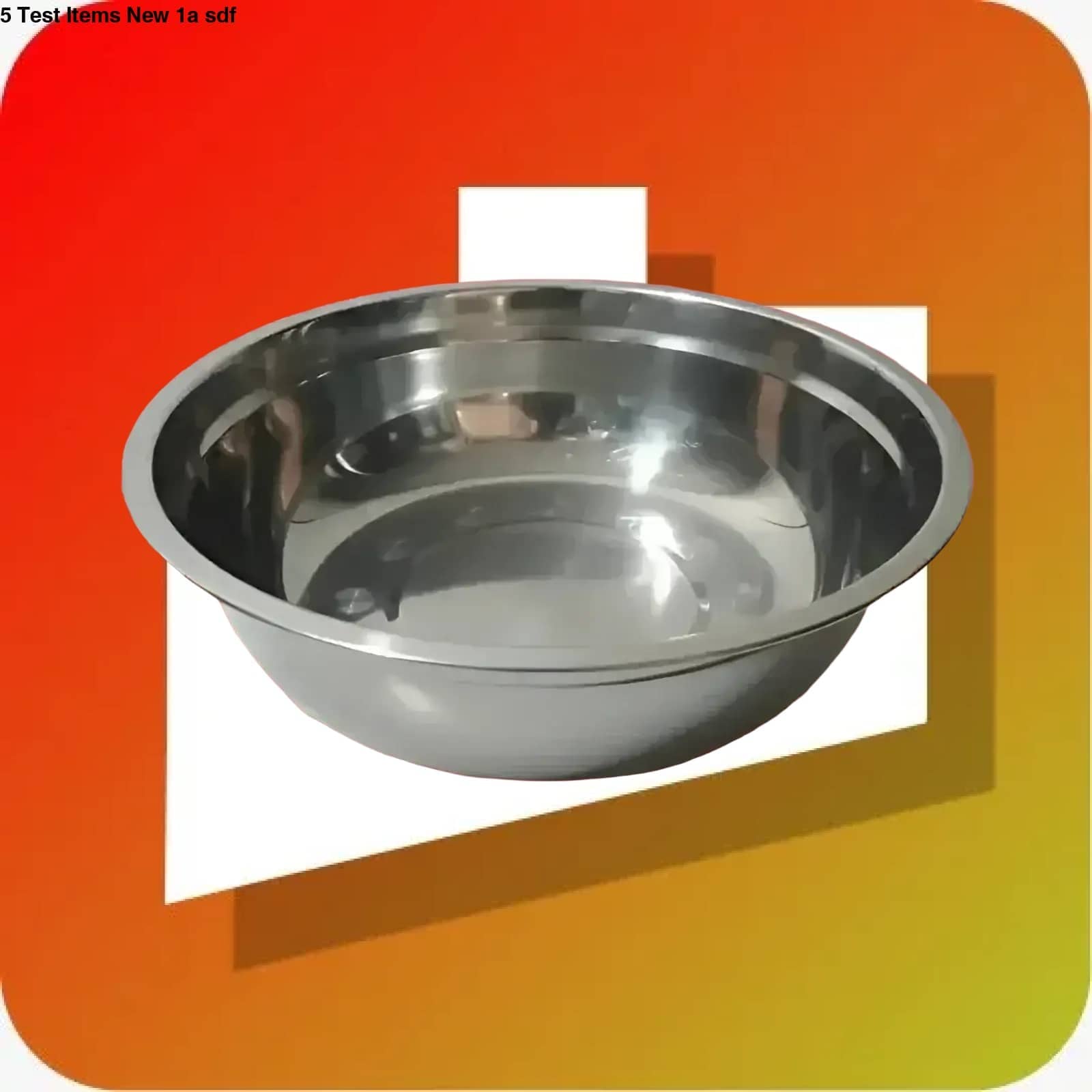 Shiny stainless steel mixing bowl with a smooth, reflective surface and rounded edges