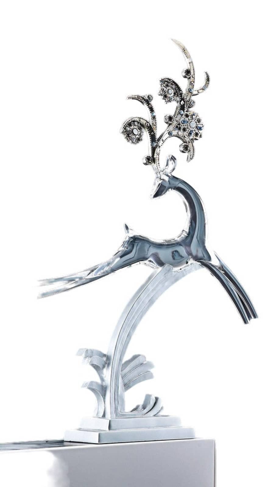 Silver metallic deer sculpture with ornate, crystal-encrusted antlers and flowing, stylized design