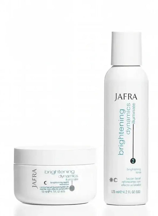 White Jafra Brightening Dynamics Balancing Facial Toner bottle and night moisturizer jar