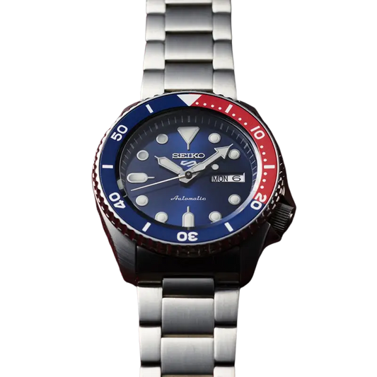 Seiko 5 automatic dive watch srpd53 with blue dial red and blue bezel and stainless steel bracelet
