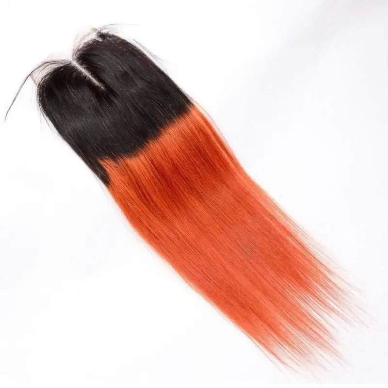 Straight hair extension with black roots and orange ends on Blue Superman Baseball Cap