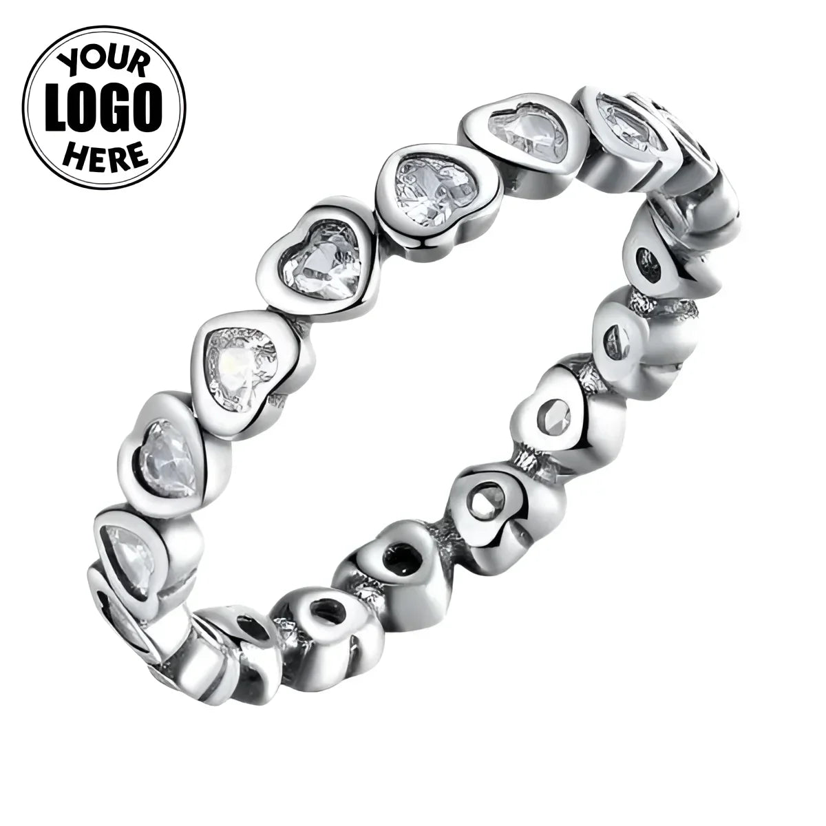 Silver heart-shaped ring with clear gemstones and polished metal Jewelry accessory