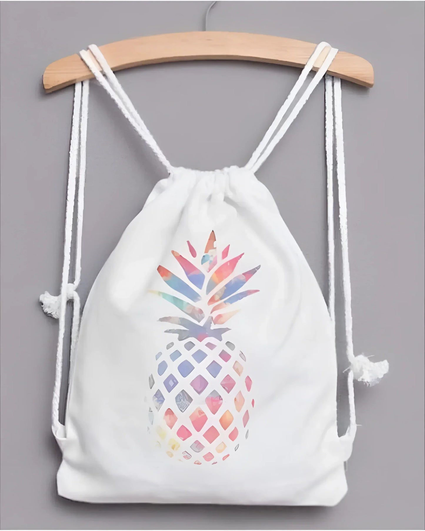 White pineapple drawstring backpack with colorful watercolor design on front for stylish storage