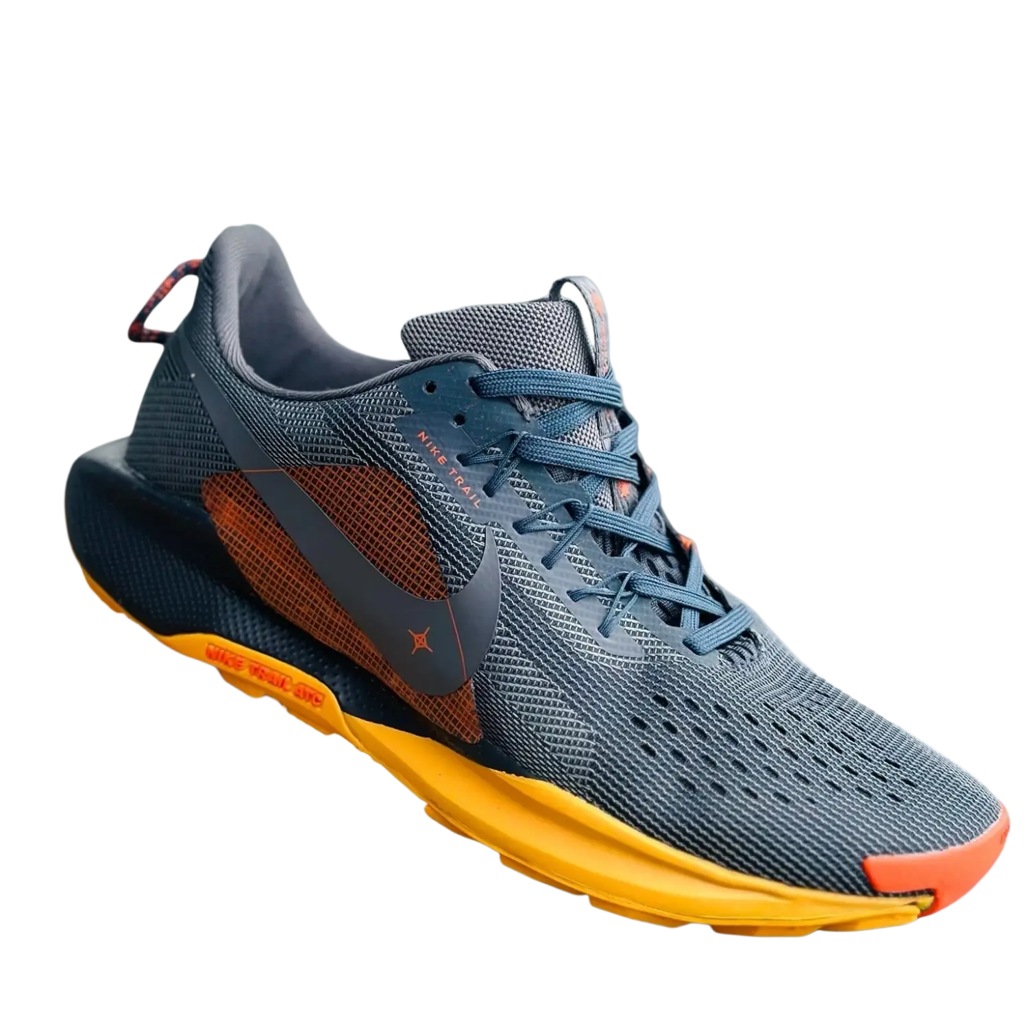 Gray and orange nike trail running shoe with mesh upper black midsole accents and yellow outsole for sports fitness