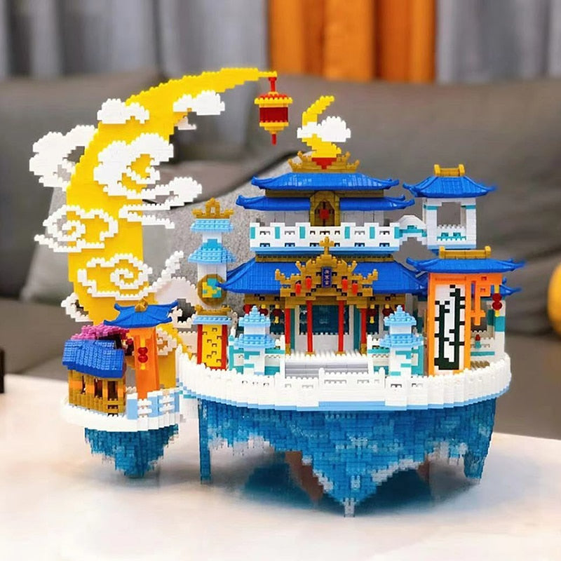 Blue and white traditional Chinese building model with golden accents for sale and buy