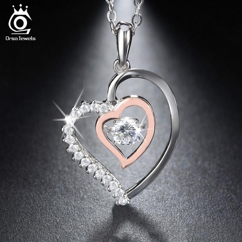 Silver heart-shaped pendant necklace with rose gold accents and clear gemstones for Swaps 4