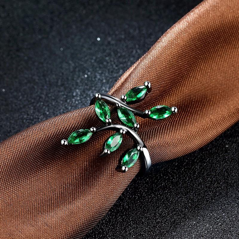 Silver leaf napkin ring with green gemstones from Test BG Photos