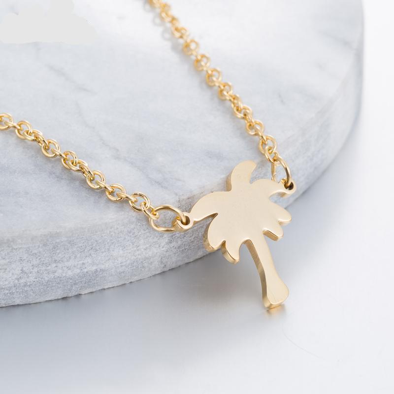 Gold palm tree necklace with delicate chain from Swaps 4 product line