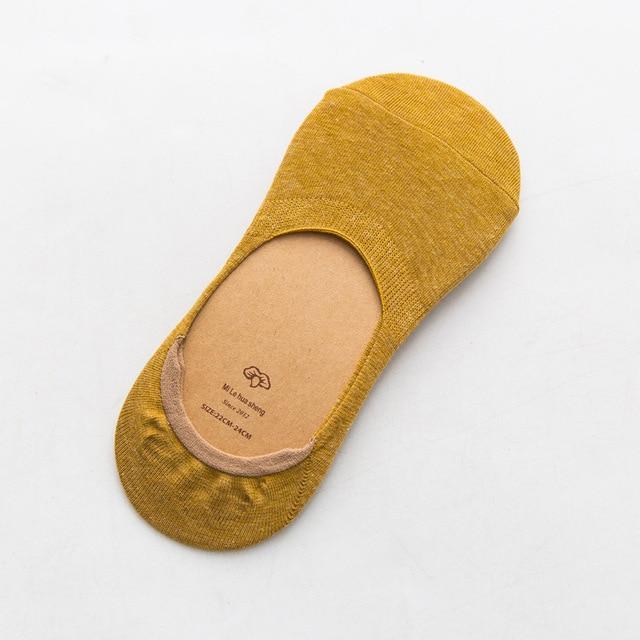 Mustard yellow no-show socks with textured pattern and pink trim from Zip Product