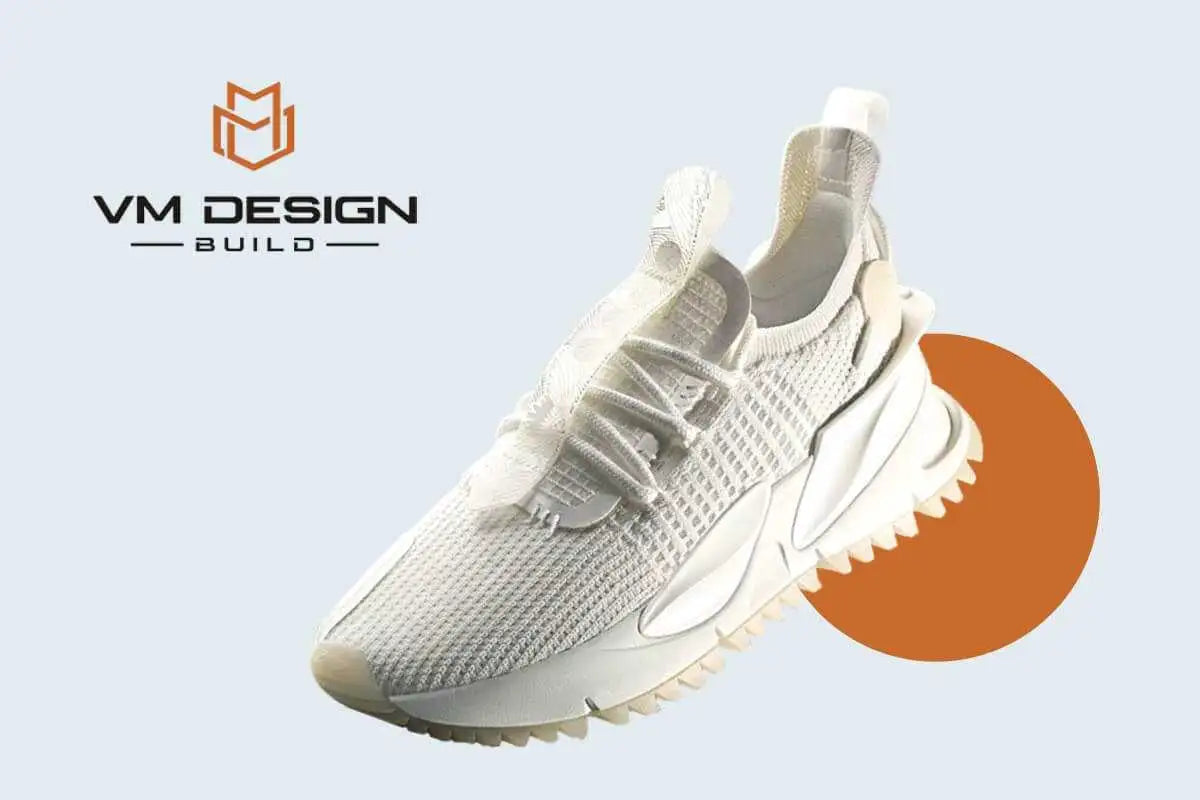 White knit sneaker with a chunky, textured sole and laces.